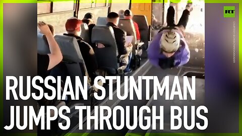 Russian stuntman jumps through bus