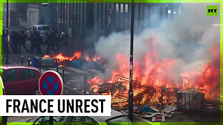 Fire, water cannons and clashes: Protests wreak havoc across France