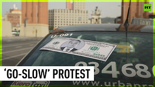 Barcelona taxi drivers ‘go-slow’ to protest being fined for boycotting rideshare apps