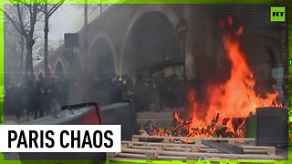 Violent clashes erupt at massive protest against pension reform in Paris