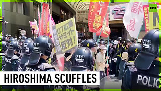 Japanese anti-G7 protesters brawl with police