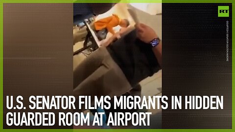 U.S. Senator films immigrants in hidden guarded room at airport