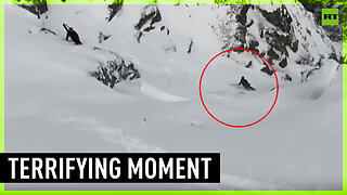 Moment skier triggers avalanche