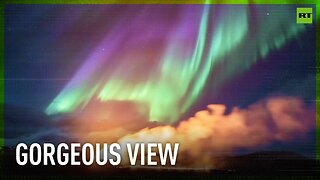 Mesmerizing combo: Aurora shines over Iceland's erupting volcano