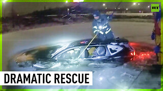 Wisconsin woman rescued after car falls into icy pond