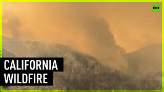 California wildfire destroys around 100 homes, injuring two