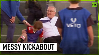 Aussie PM accidentally bulldozes 8-year-old during football match