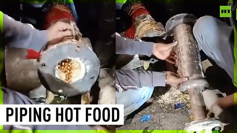 Trapped tunnel workers receive first hot meal through new rescue pipe