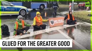 Activists glue themselves to roads in Germany, demanding climate action