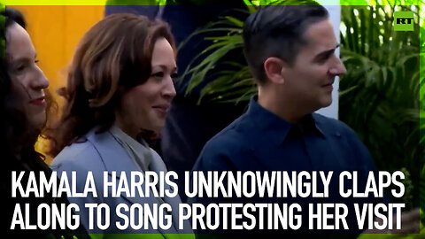 Kamala Harris unknowingly claps along to song protesting her visit