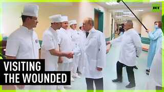 Putin and Shoigu visit wounded troops in military hospital