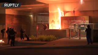 Protesters set fire to ICE building in Portland