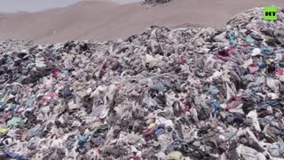 MOUNTAINS of DISCARDED clothing piled high in the Atacama Desert
