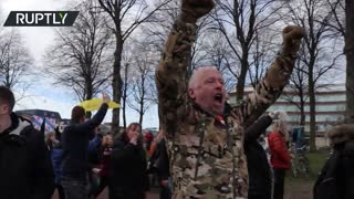 Police clash with anti-lockdown protesters in The Hague, Netherlands