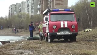 EMERCOM workers rescue three children from an ice floe in Russia's Zlatoust