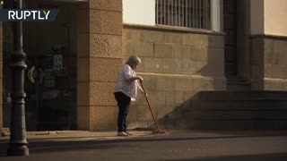 La Palma residents clean ash from streets following Cumbre Vieja volcano eruption