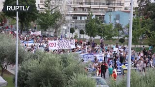 Protesters march in Thessaloniki in a rally against mandatory vaccinations