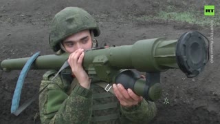 Russian snipers and rifle brigades hone their skills in military drills