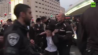 Orthodox protesters scuffle with police outside Supreme Court in Jerusalem