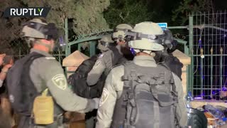 Palestinians scuffle with police as protests continue against planned evictions in East Jerusalem