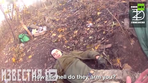 Russian troops save injured Ukrainian soldier
