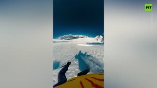 Skier defies death after falling into abyss