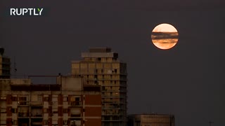 ‘Pink Supermoon’ rises above Buenos Aires