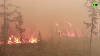 Wildfires rage over Siberia