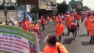 Hundreds march through the Peruvian capital, Lima, in a May Day demonstration
